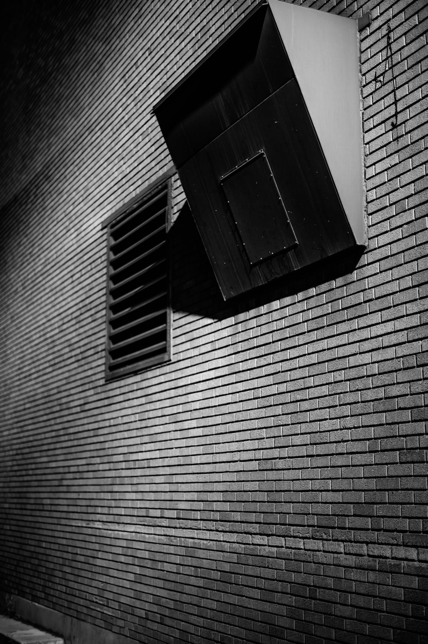 Brick wall of building with system of ventilation