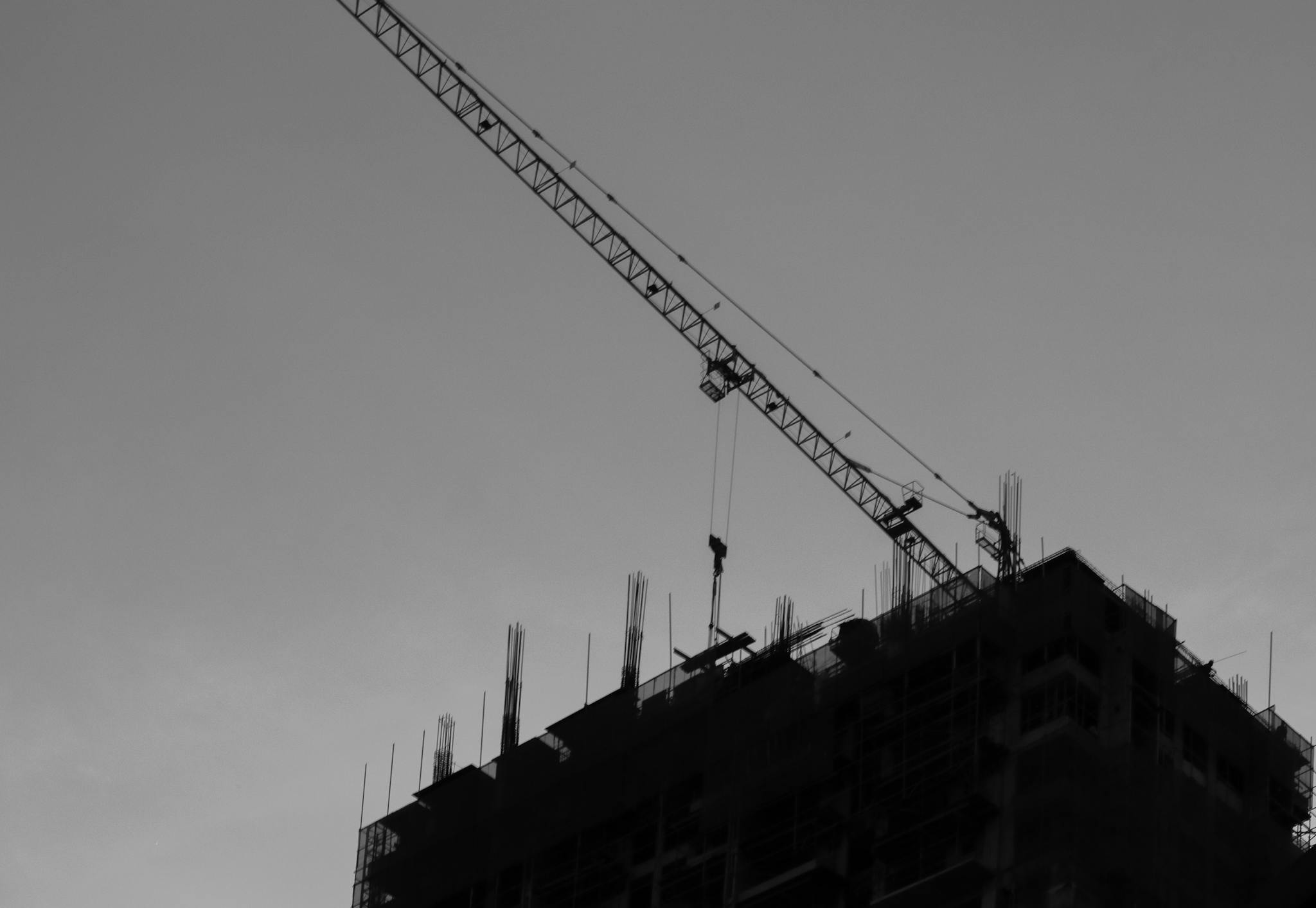Metal Crane on Top of Building